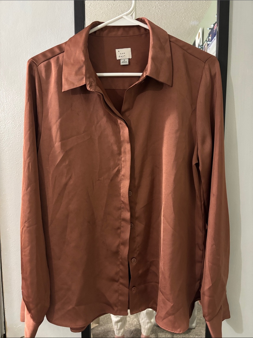 A New Day woman’s Rust Brown Long-Sleeve Button-Up Shirt